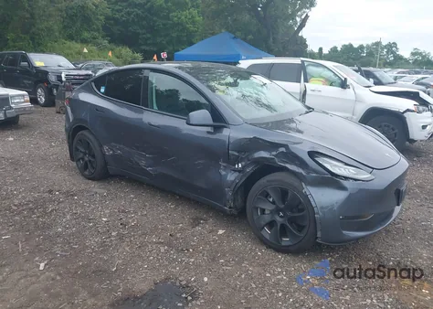 2023 Tesla Model Y Awd/Long Range Dual Motor All-Wheel Drive from USA, damaged, VIN 7SAYGAEEXPF617722